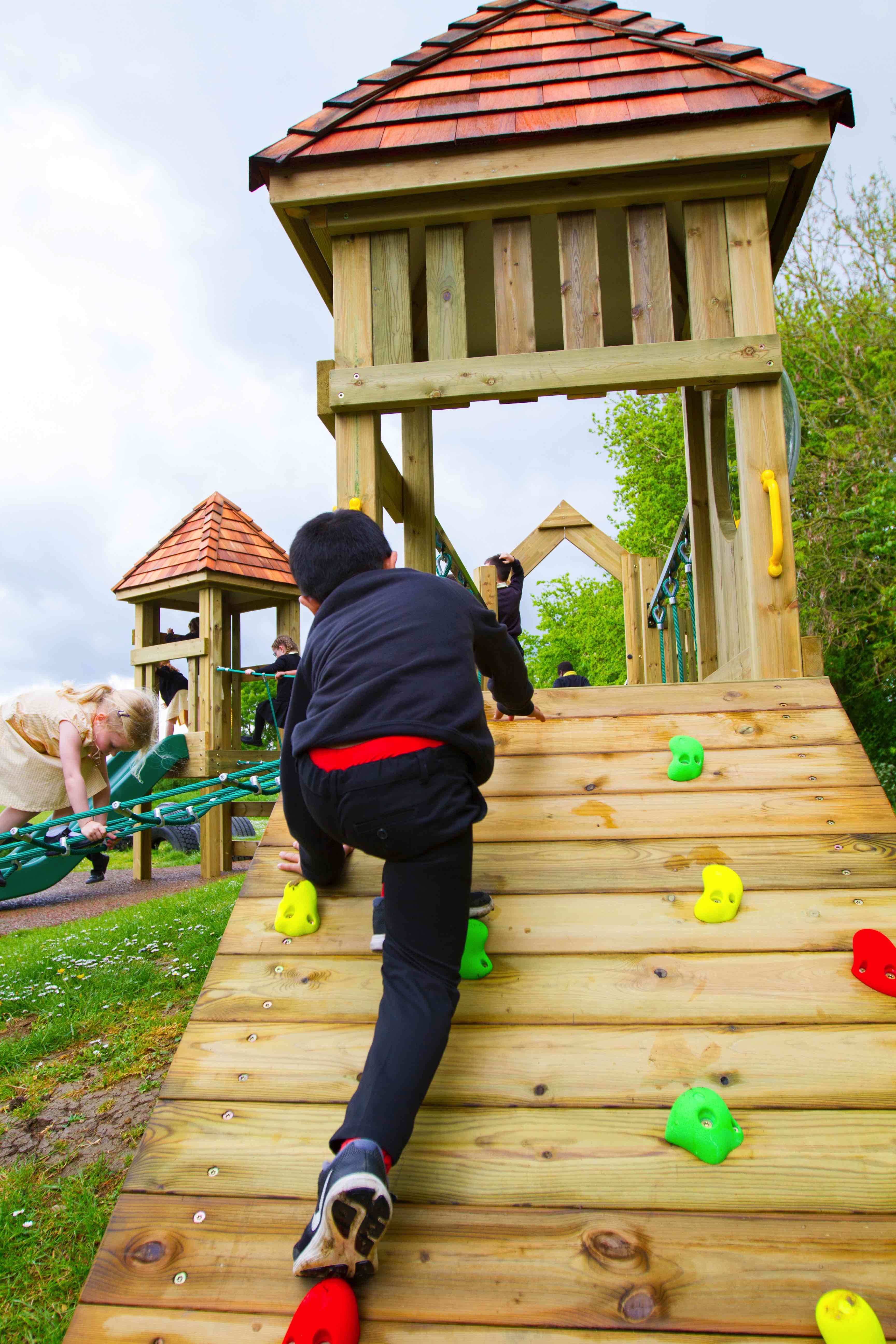 Every childs play area needs the wooden ramp climber !