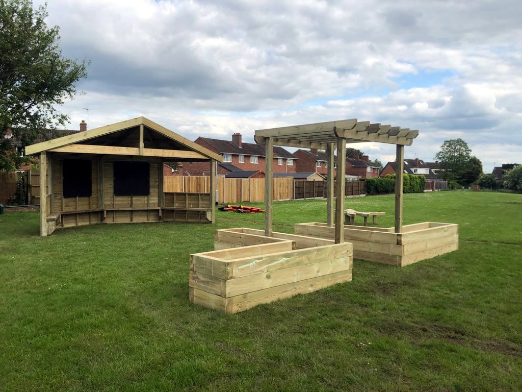 Wooden shelters for outdoor learning in school field