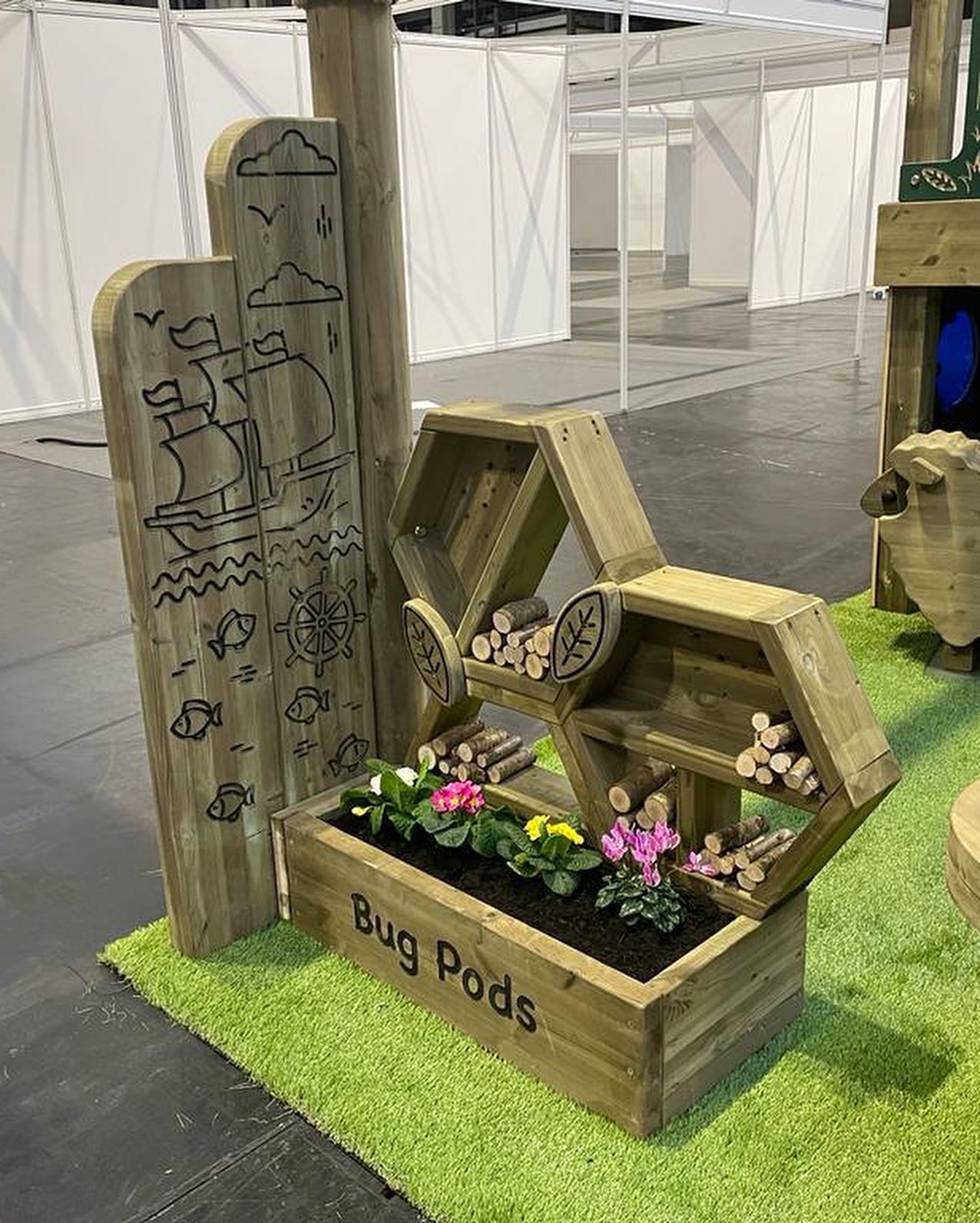 Playground wooden planters, totems and bug pods