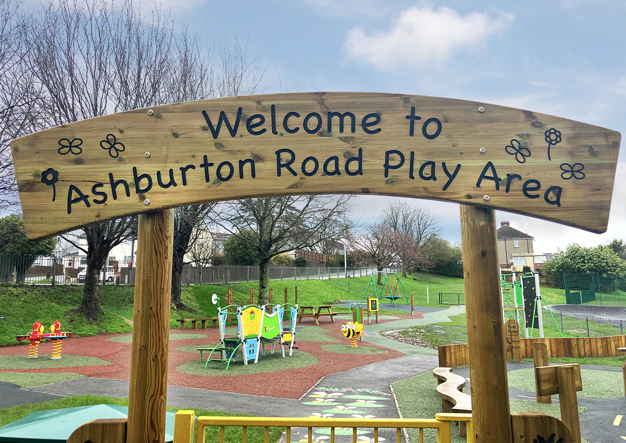 A play area welcome sign